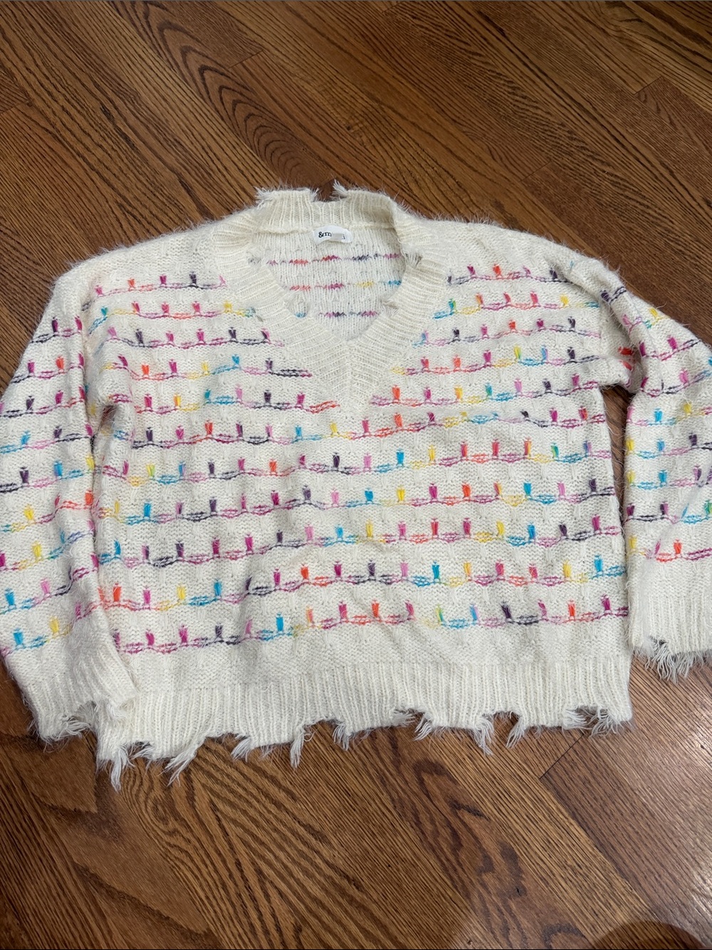 Cream V-Neck Sweater with Multicolor Stitch Accents